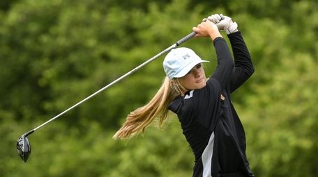 Kaitlyn Brown of St. Anthony's drives the ball