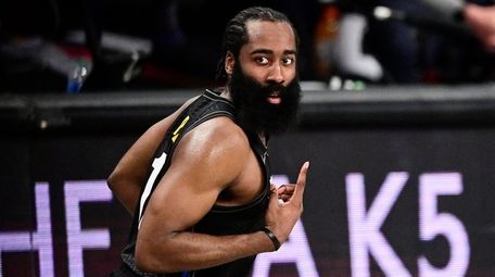 James Harden of the Nets celebrates a three-point