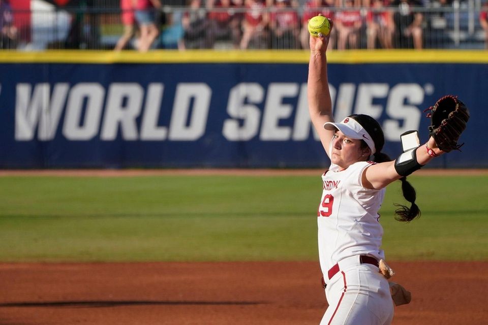 Oklahoma's Nicole May pitches in the first inning