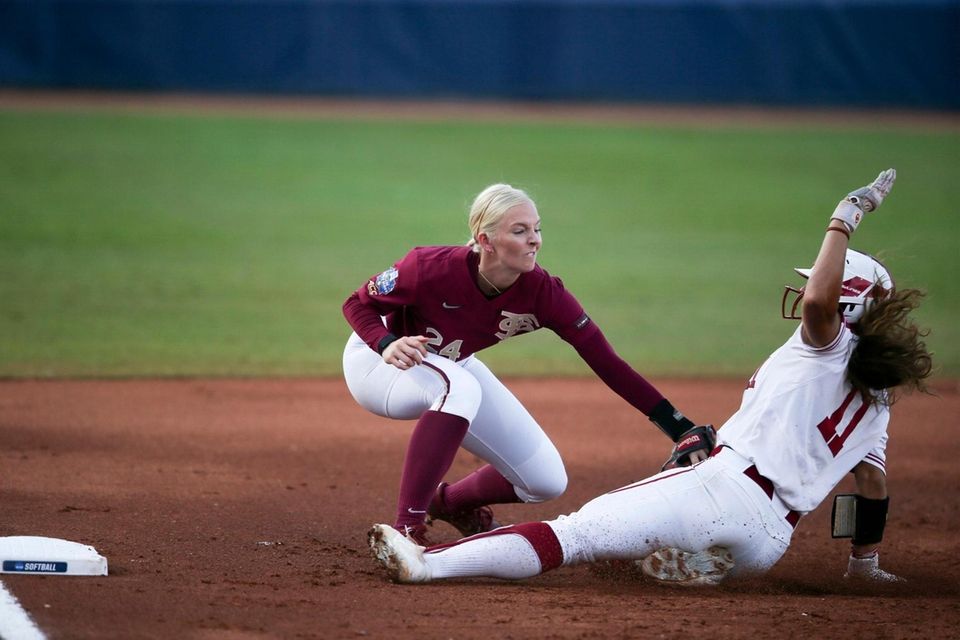 Florida State's Sydney Sherrill tags out Oklahoma's Nicole