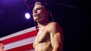 Chris Wade prepares to enter the cage before