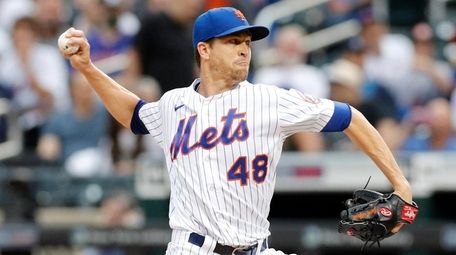 Jacob deGrom of the Mets pitches during the
