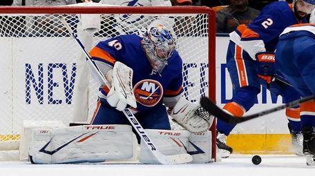 Ilya Sorokin of the New York Islanders defends