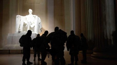 A group visits the Lincoln Memorial in Washington,