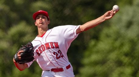 Nick Rizzo of East Islip throws to the