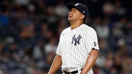 Wandy Peralta #58 of the Yankees reacts on