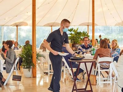 Outdoor tent dining at Stone Creek Inn in