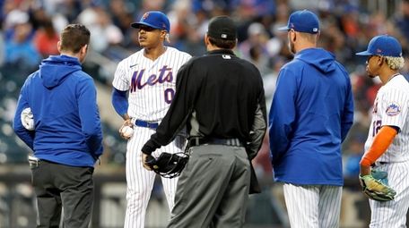 Marcus Stroman of the Mets is checked out