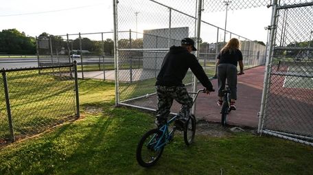 Cyclists at Manor Field Park in Huntington Station