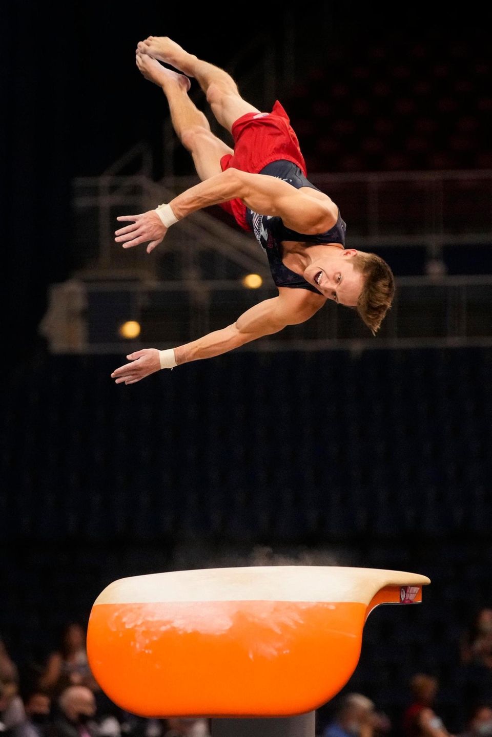 Allan Bower competes on the pommel horse during