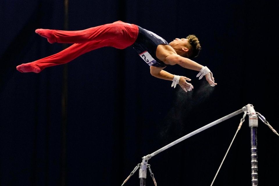 Yul Moldauer competes on the horizontal bar during