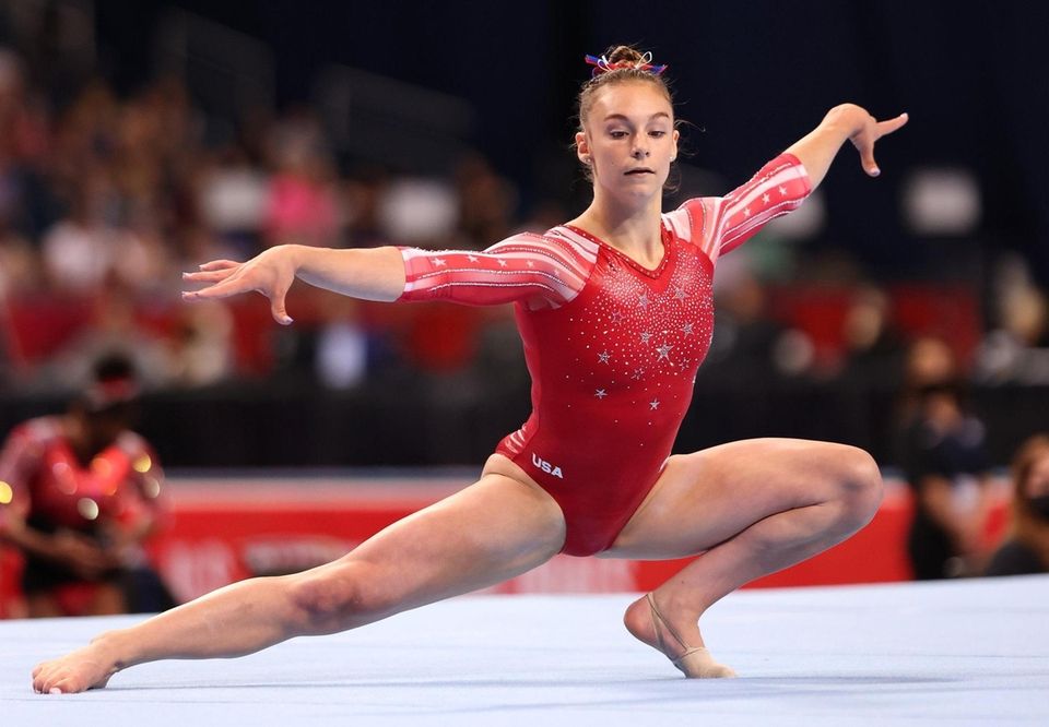 Grace McCallum competes in the floor exercise during