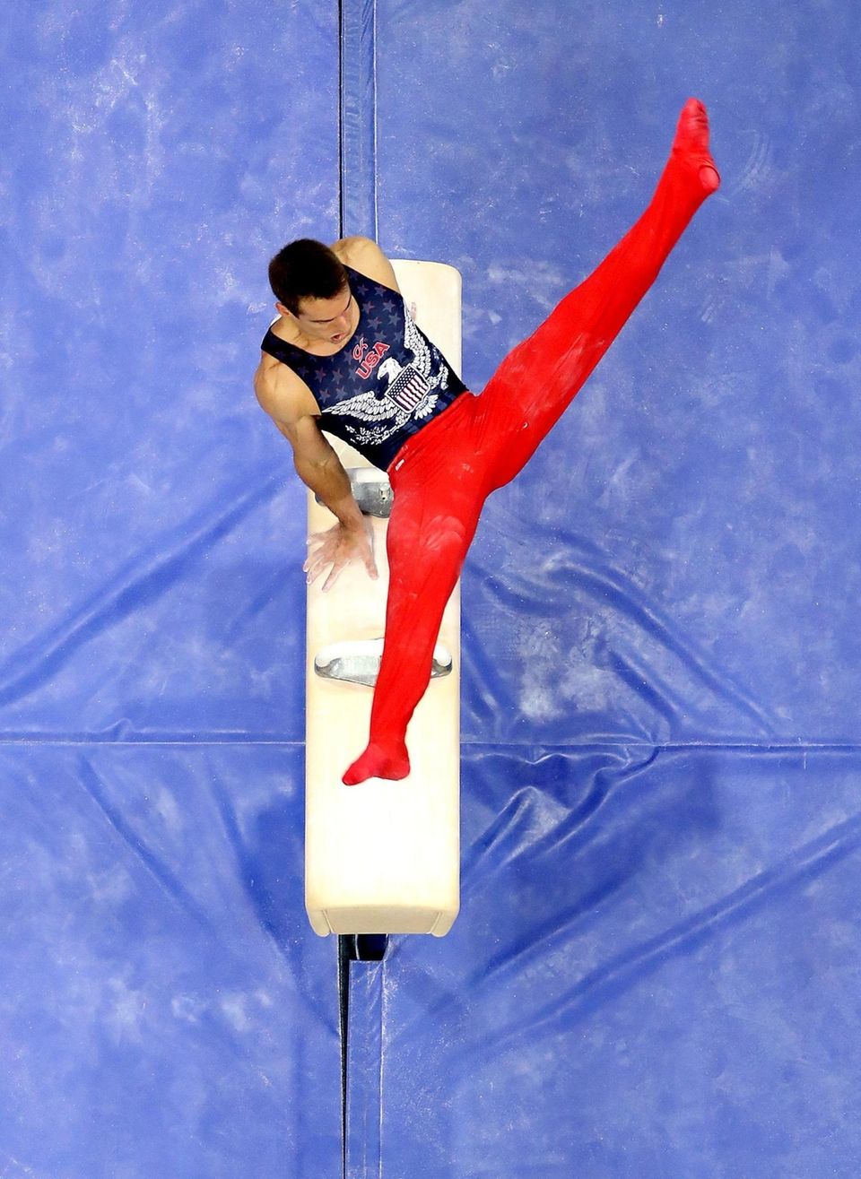 Mikulak competes on the pommel horse during the