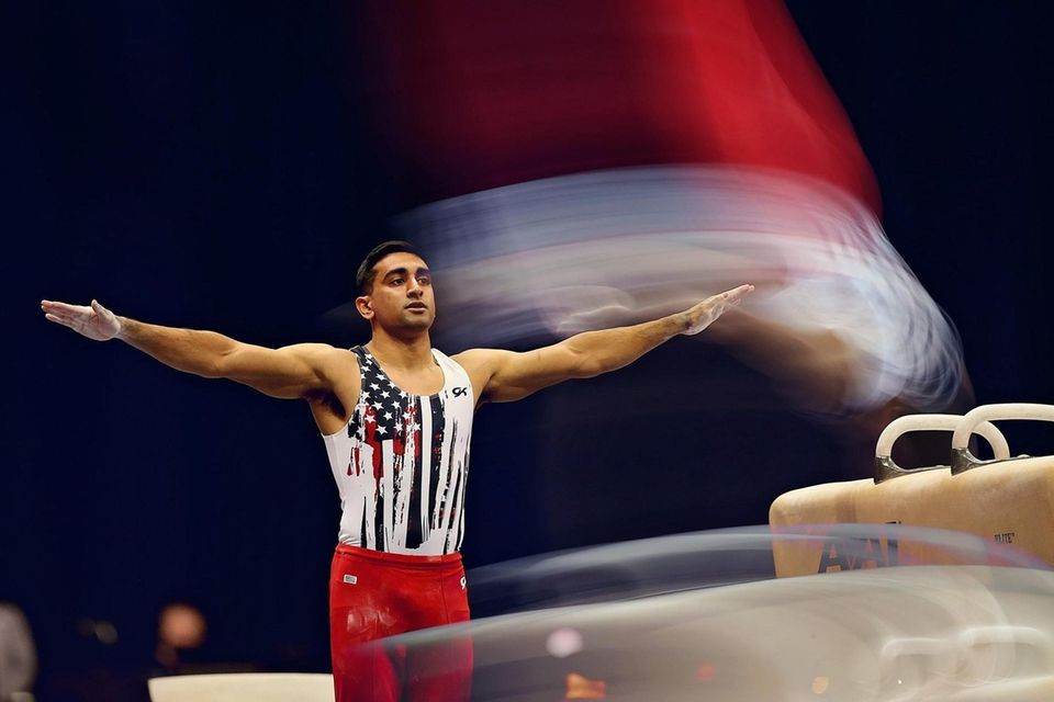 Akash Modi competes on the pommel horse during