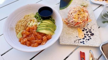 A sushi poke bowl and Miru Mountain at