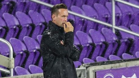New York City FC coach Ronny Deila watches