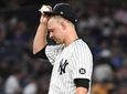 Yankees starting pitcher Michael King stands on the