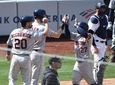 The Astros' Jose Altuve and teammates celebrate his