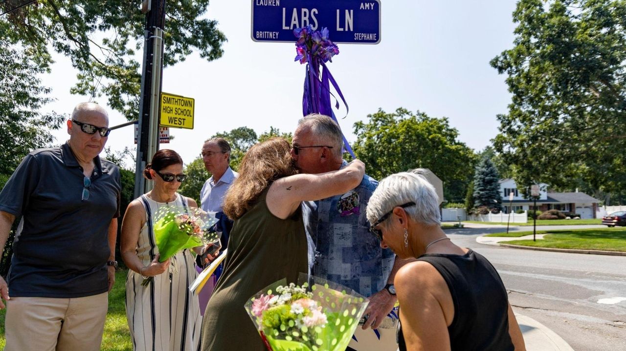 Families and friends gathered Saturday in Smithtown to remember the four