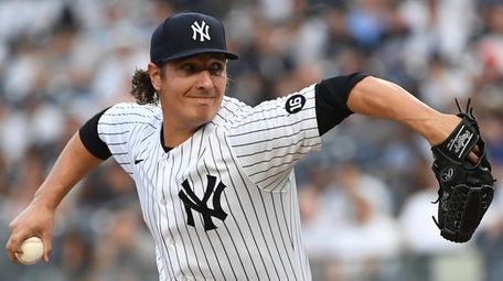 Yankees starting pitcher Asher Wojciechowski delivers against the