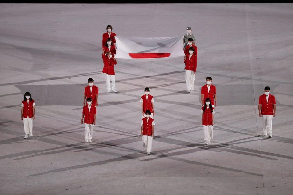 The Japanese National Flag is brought onto the