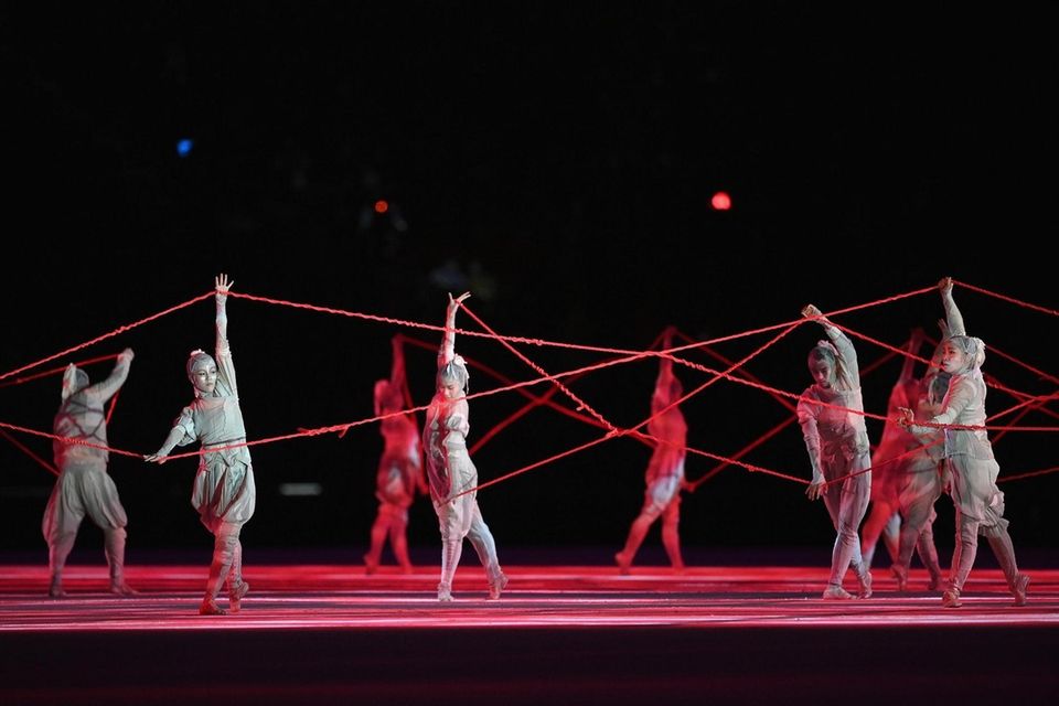 Performers are seen during the Opening Ceremony of