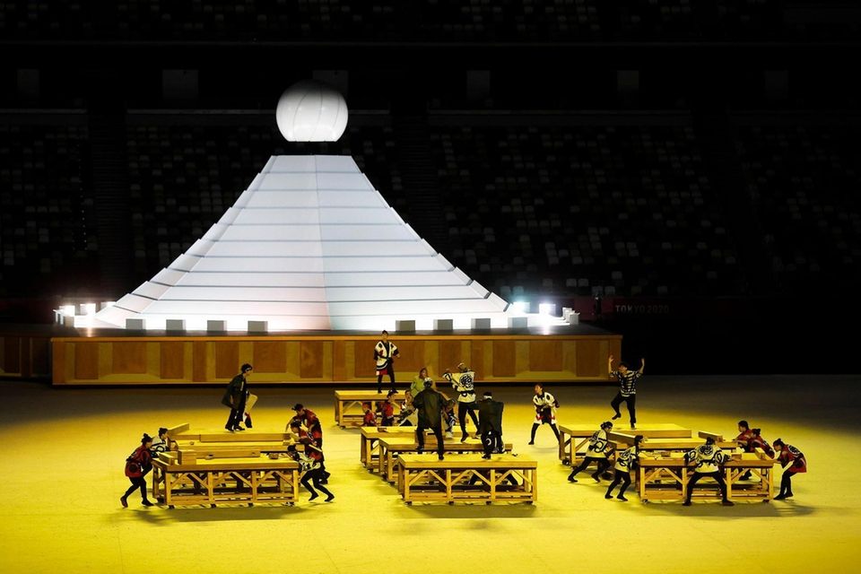 A group of performers carry out a routine