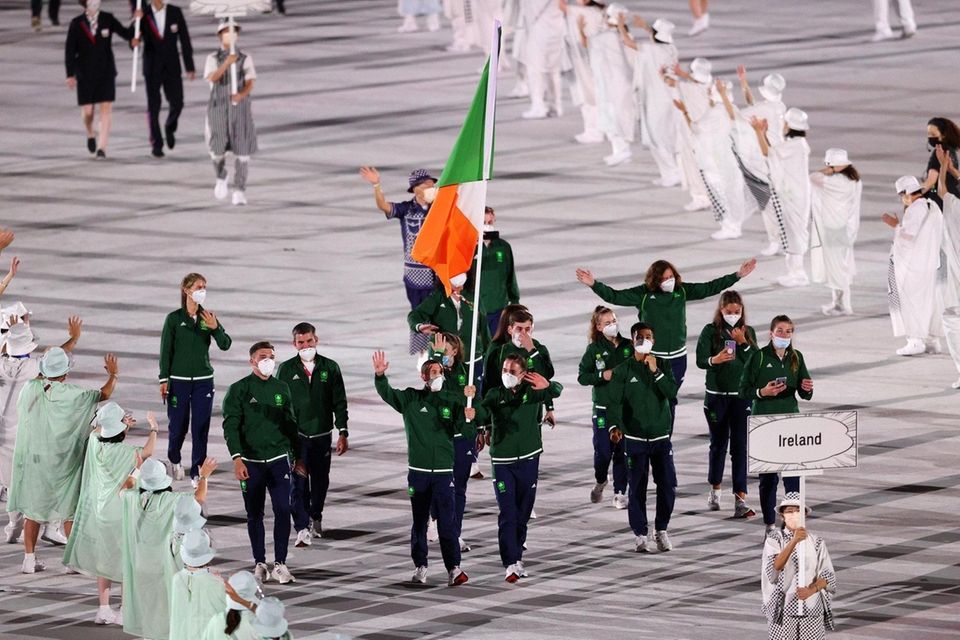 Flag bearers Kellie Anne Harrington and Brendan Irvine