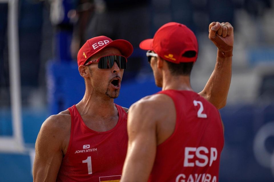 Pablo Herrera Allepuz, of Spain, left , celebrates