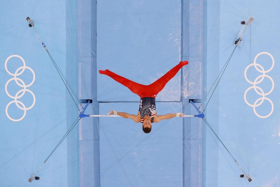 Sam Mikulak of Team United States competes on