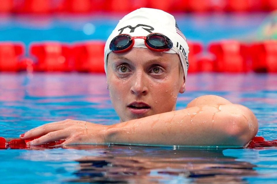 Katie Ledecky, of the United States, reacts following