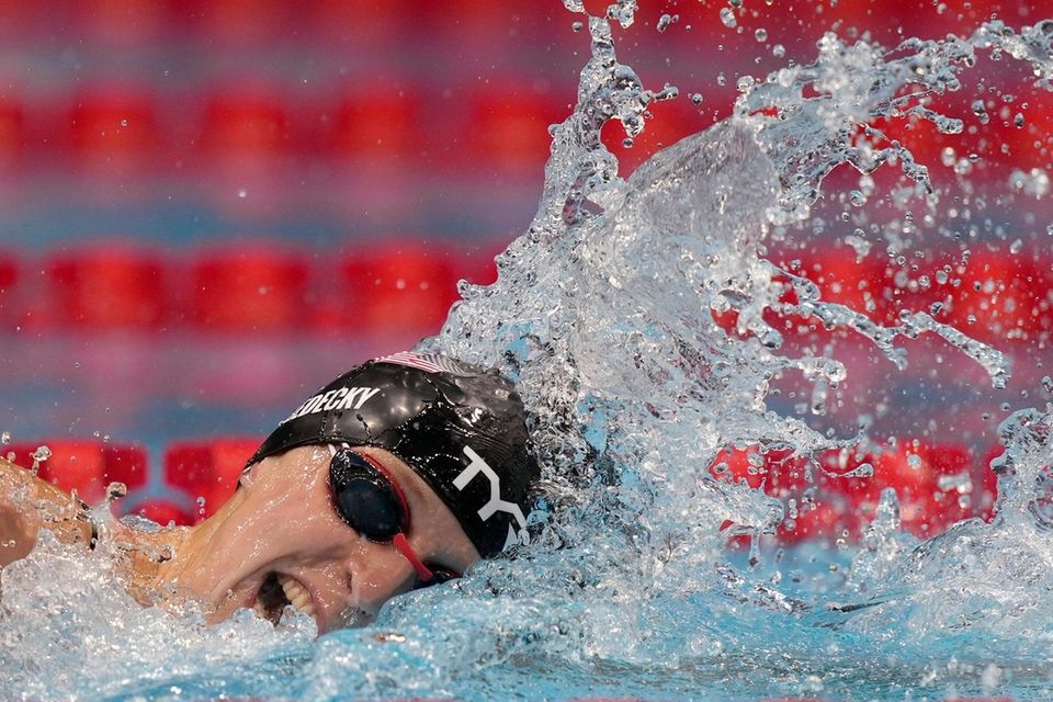 Katie Ledecky, of United States, swims in a