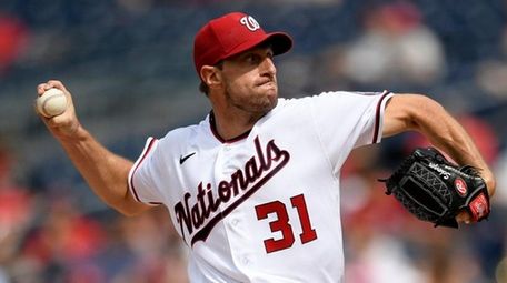 Nationals starter Max Scherzer delivers a pitch during