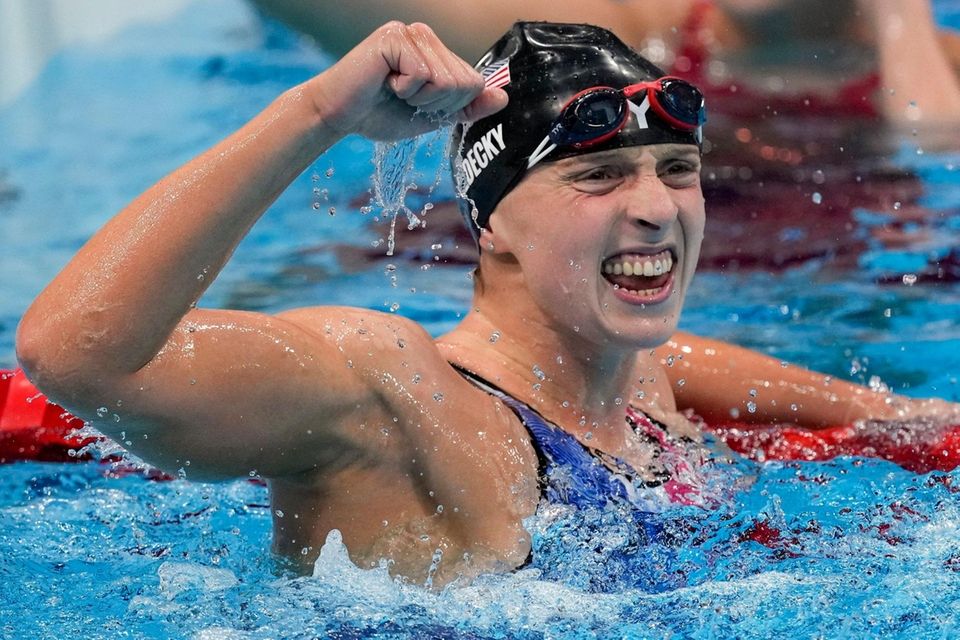Katie Ledecky, of the United States, celebrates after