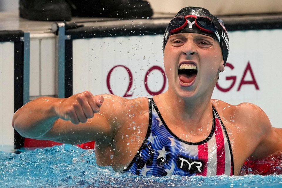 Katie Ledecky, of the United States, reacts after