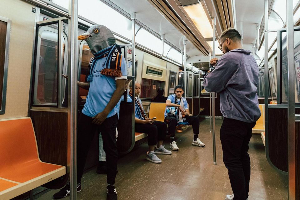 NYCFC midfielder Jesús Medina, NYCFC supporter Omari McCleary