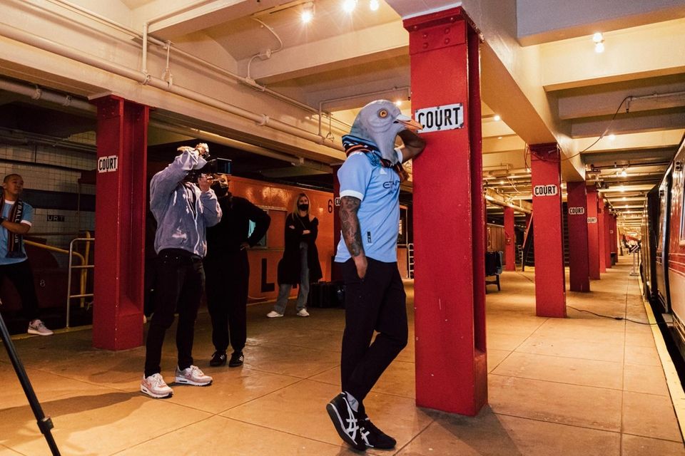 NYCFC supporter Omari McCleary models the club's new