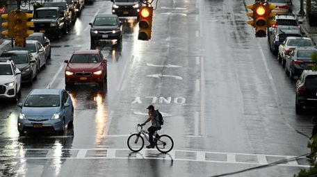 A person crosses Great Neck Road in Copiague,