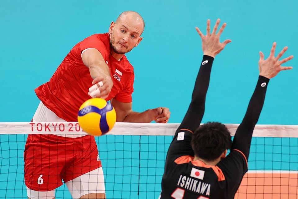Bartosz Kurek #6 of Team Poland strikes against