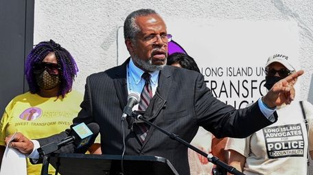 Attorney Frederick Brewington speaks during a press converence