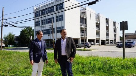 Business partners Paul Posillico, left, and Robert DiNoto