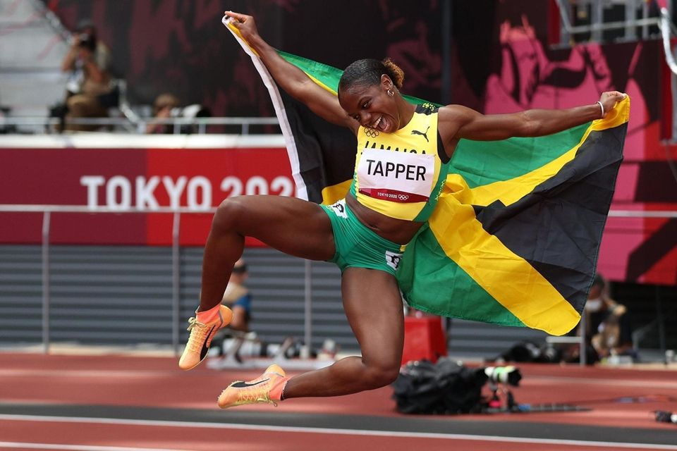Megan Tapper of Team Jamaica celebrates winning the