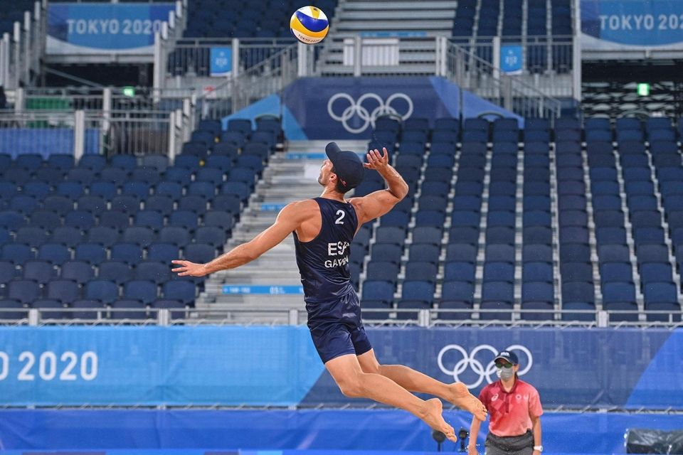 Spain's Adrian Gavira Collado serves a ball in