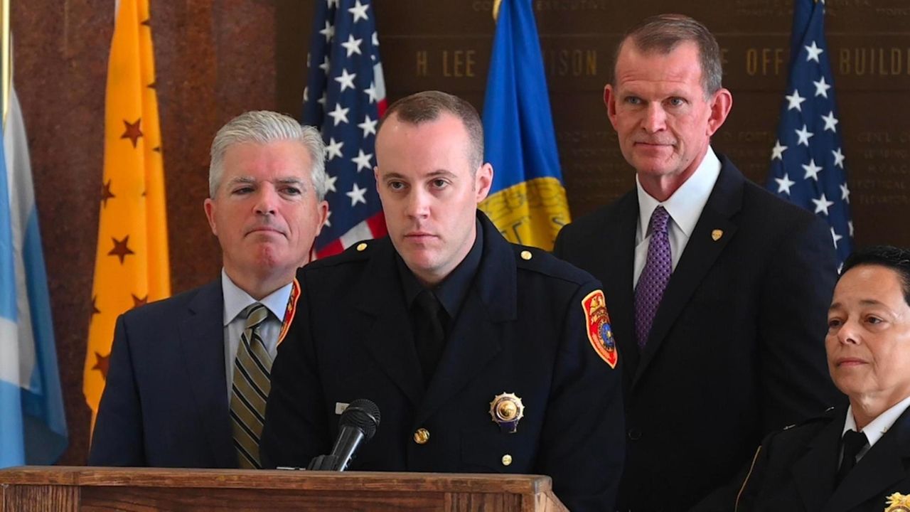 Christopher Racioppo, in uniform and walking unassisted, said