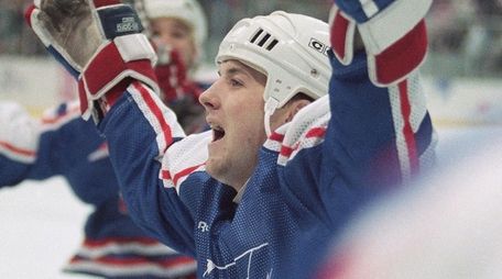 USA's John Lilley celebrates his third period power-play