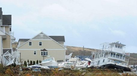 Damaged homes and displaced boats in Island Park