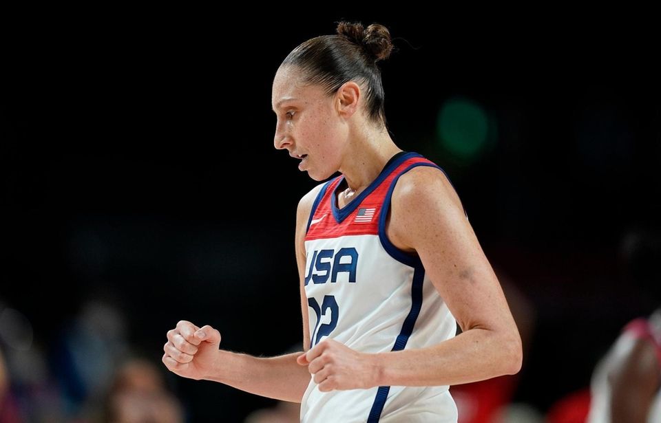 United States' Diana Taurasi (12) celebrates during women's