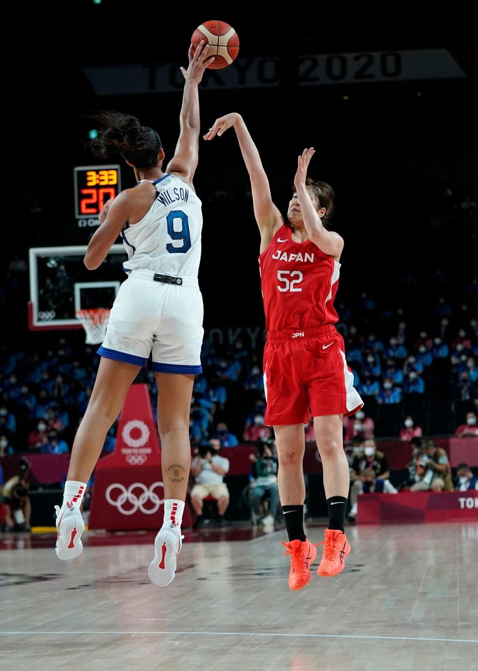 United States' A'Ja Wilson (9) shoots over Japan's