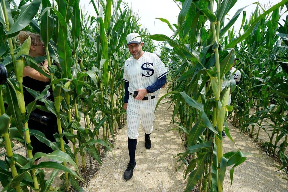 Chicago White Sox pitching coach Ethan Katz walks