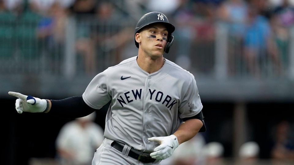 The Yankees' Aaron Judge rounds the bases after